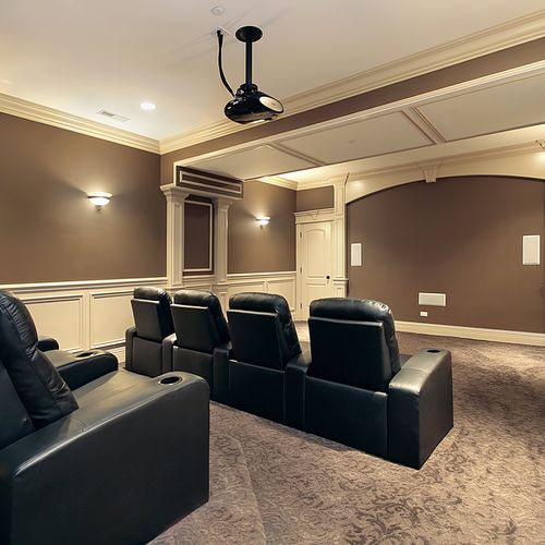 Dedicated home theater systems with a drop down sc