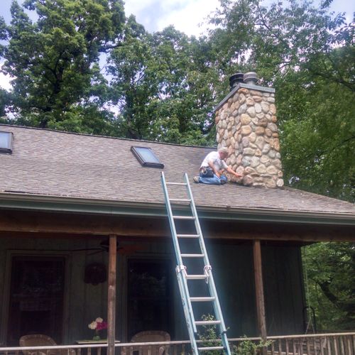 Checking the condition of the roof and chimney fla