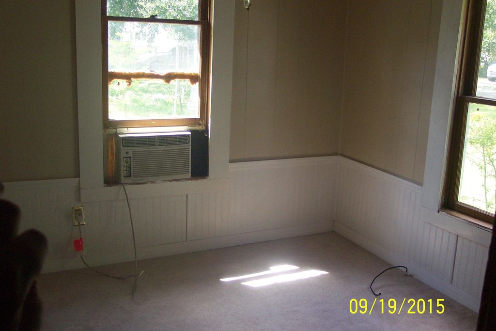 after.... new flooring, painting, added wainscott.