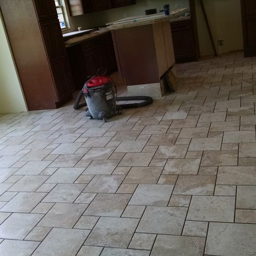 TIle floor in Dining and Kitchen for Lee Boles.
