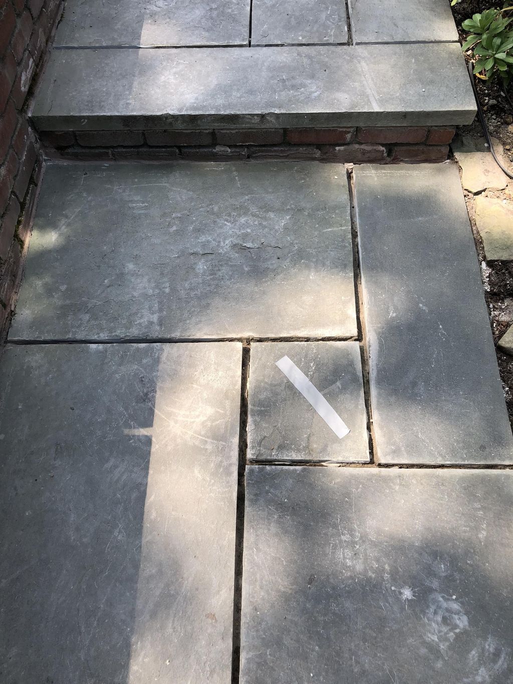 Bluestone Patio Rehab. Grind out joints. 