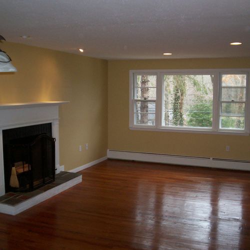 Stained hardwood floors, new recessed lights, and 