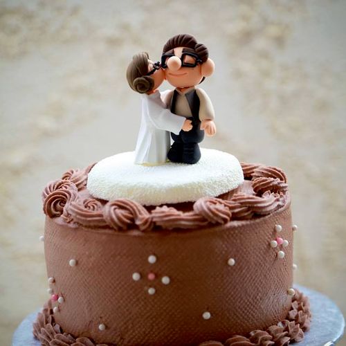 Top Tier Wedding Cake with Cupcake below