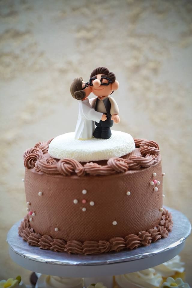 Top Tier Wedding Cake with Cupcake below