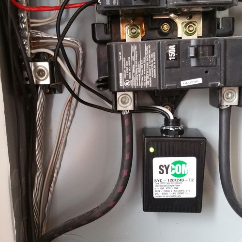 Installed electrical panel surge protector