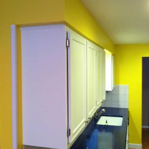 Kitchen cabinets/walls refinishing