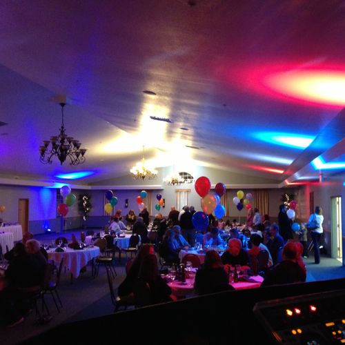 Uplighting that changed colors for a surprise 60th