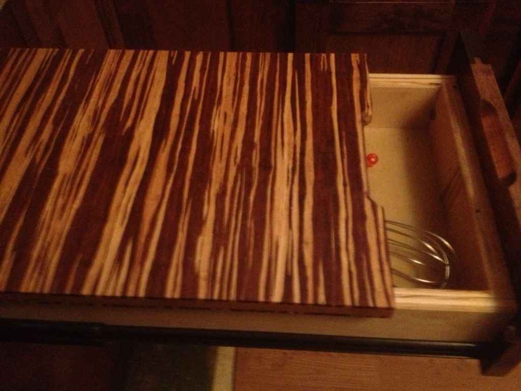 drawer with tiger wood cutting board