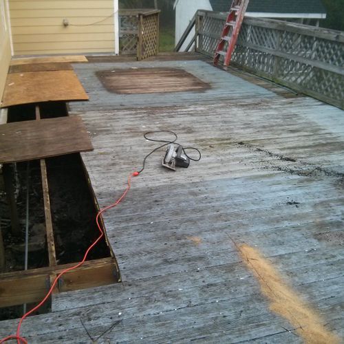 Removed decking and sured up joists that needed it