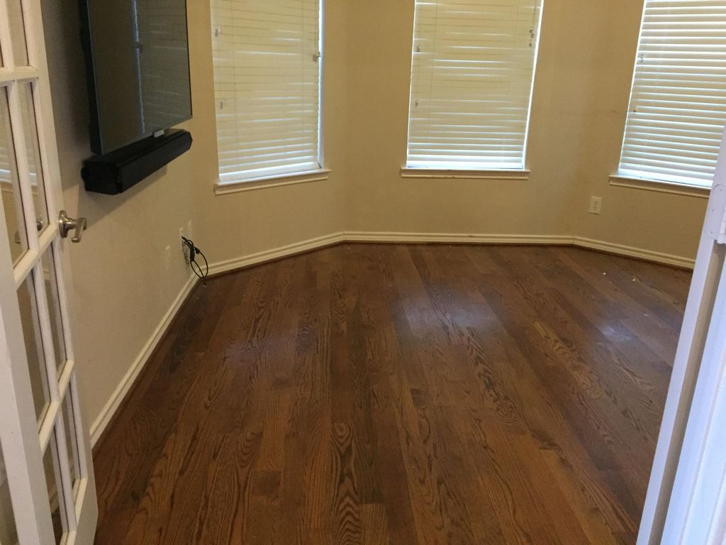 After photo of the walnut stained floors with fini