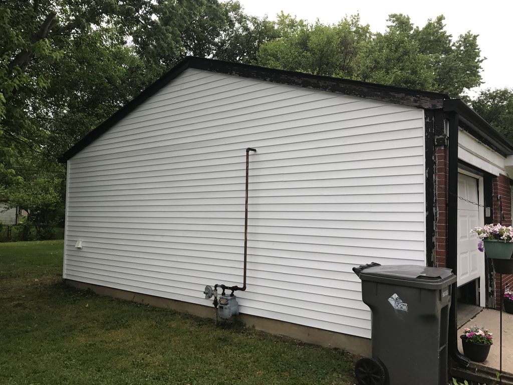 New siding and gutter installation