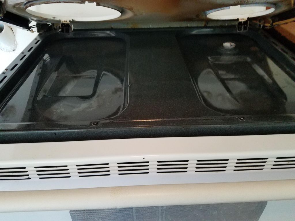Under the hood of the stove after