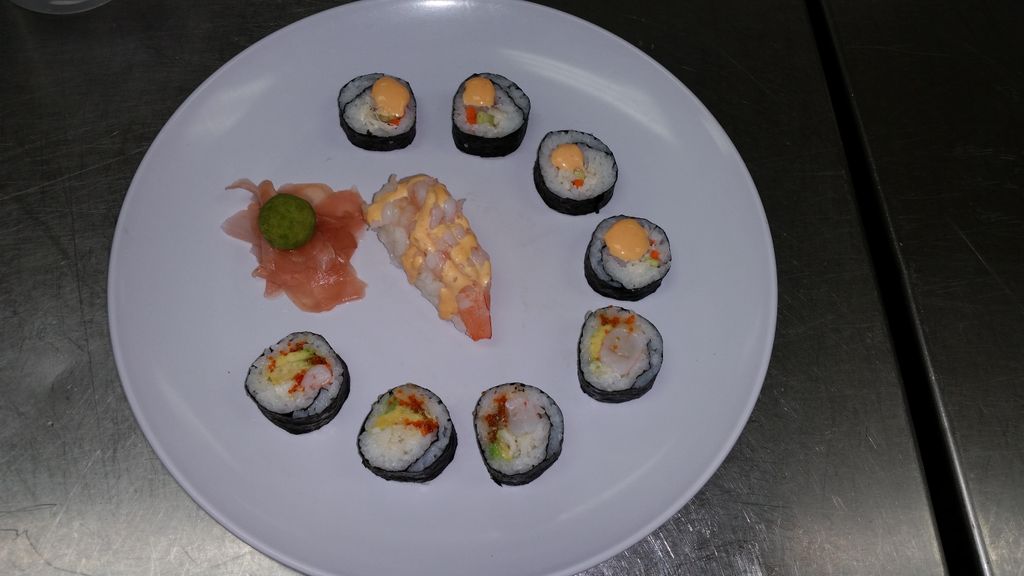 Hand rolled Maki roll with shrimp and shrimp nigir