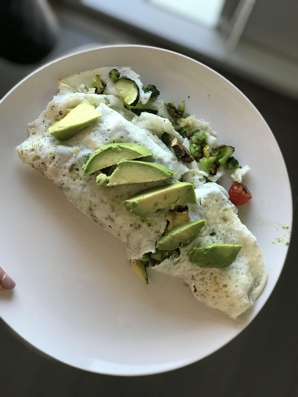 Egg white omelet filled with broccoli, spinach, mu