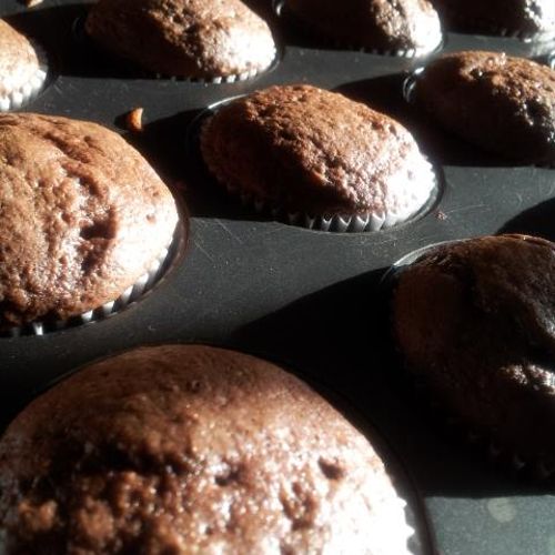 Fluffy chocolate cupcakes straight from the oven