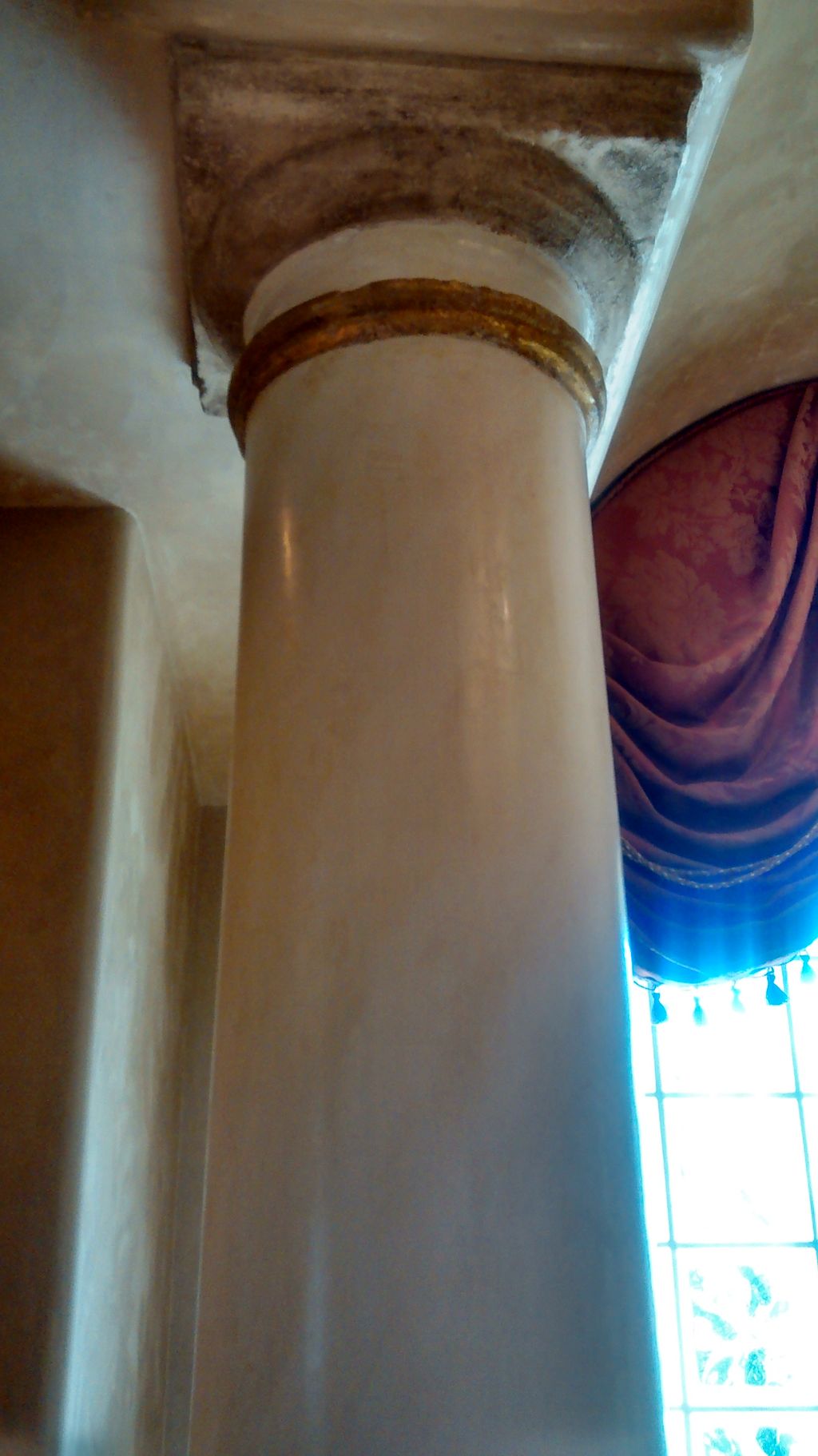 Concrete column overlaid with Italian polished pla