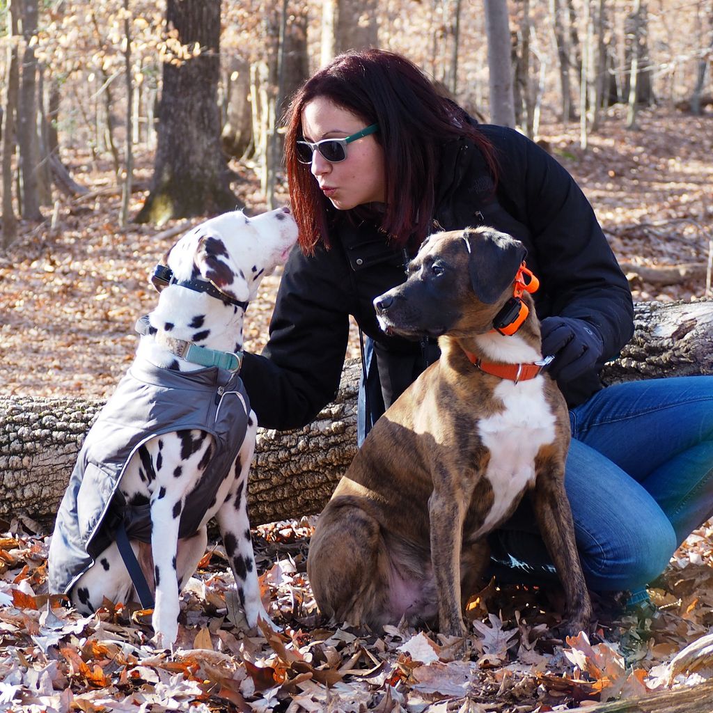 Lara posing for a photo with her pack.