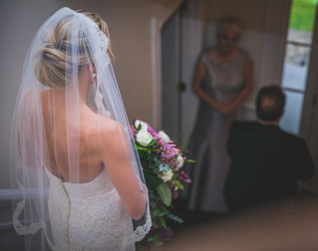 "First Look with Dad" as Mom looks on