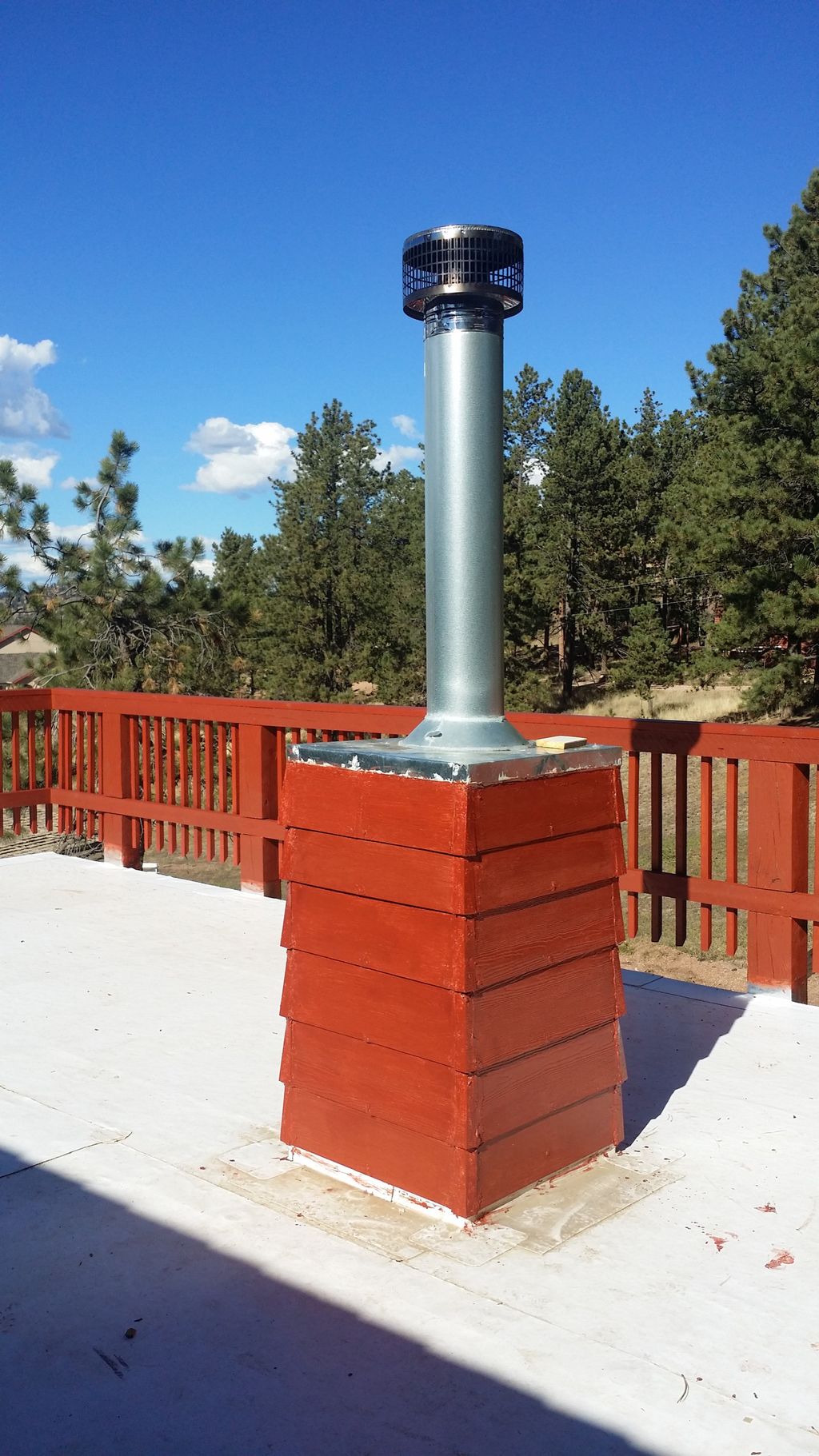 A new Chimney going through a flat roof.
