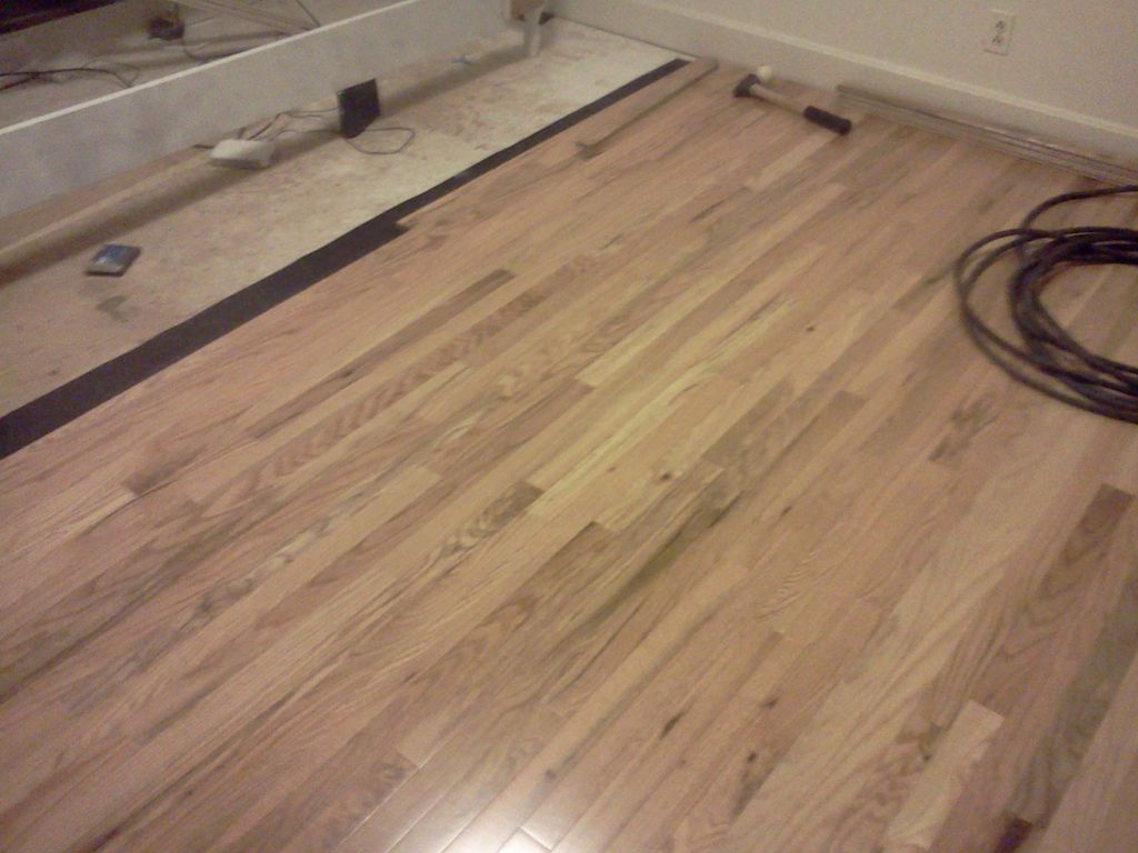 Here we are installing some Maple Hardwood floorin