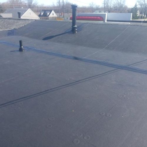 This client had a complete new commercial epdm roo