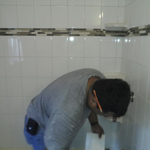 Shower walls being tiled