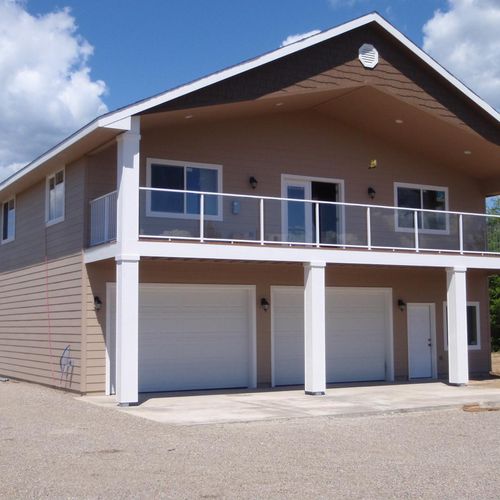 Shop/garage home combo with covered deck. Custom d