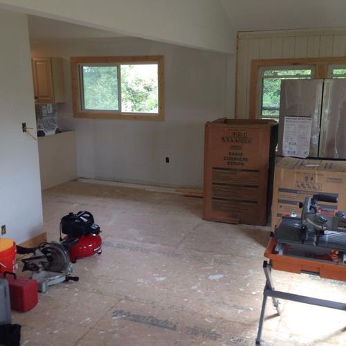 Before (Living Room Laminate Flooring/ Trim)