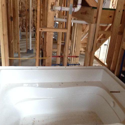 Bathrooms, from the rough plumbing to installing s