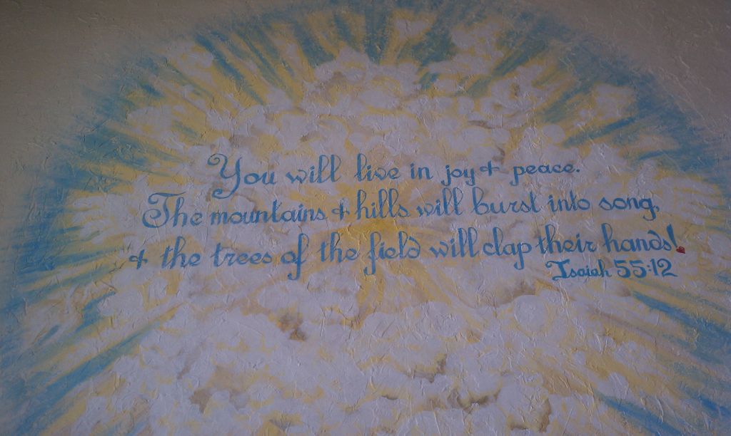 Freehand lettering over an image of light bursting