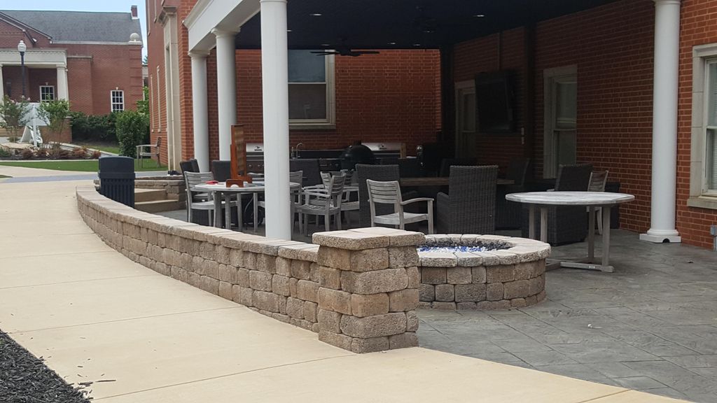 Fire pit, retaining wall, and outdoor kitchen.