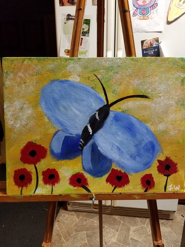 Blue butterfly painted with acrylic paint.