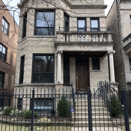 Renovation of a Chicago greystone 2 flat into a 2 