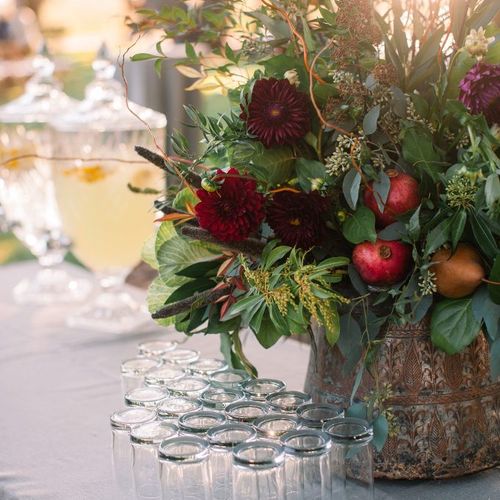 Fall centerpiece with fresh fruit added and rich w