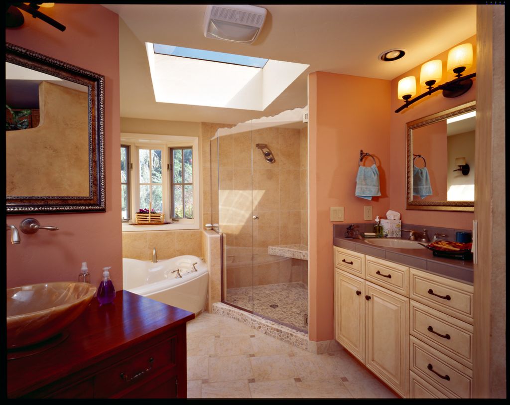 Elegant master bathroom remodel featuring custom-m