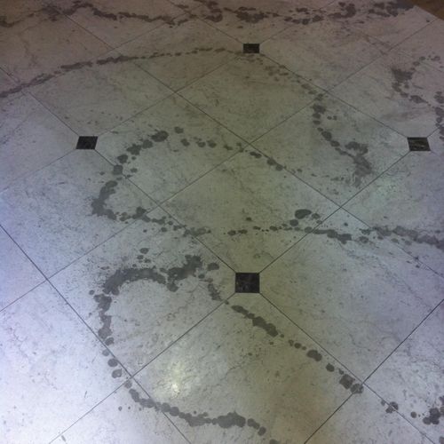 Acid etching on marble floor