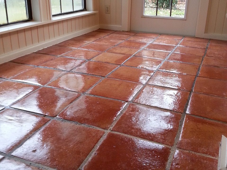 Spanish tile. Strip and wax.