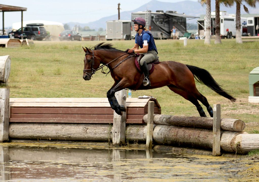 Training youngster jumping into water