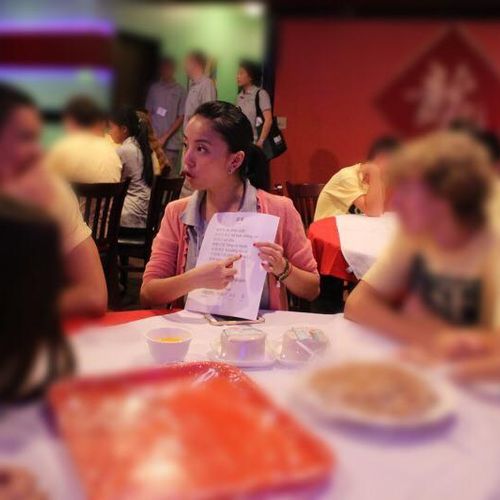 Explaining a Chinese menu to students 