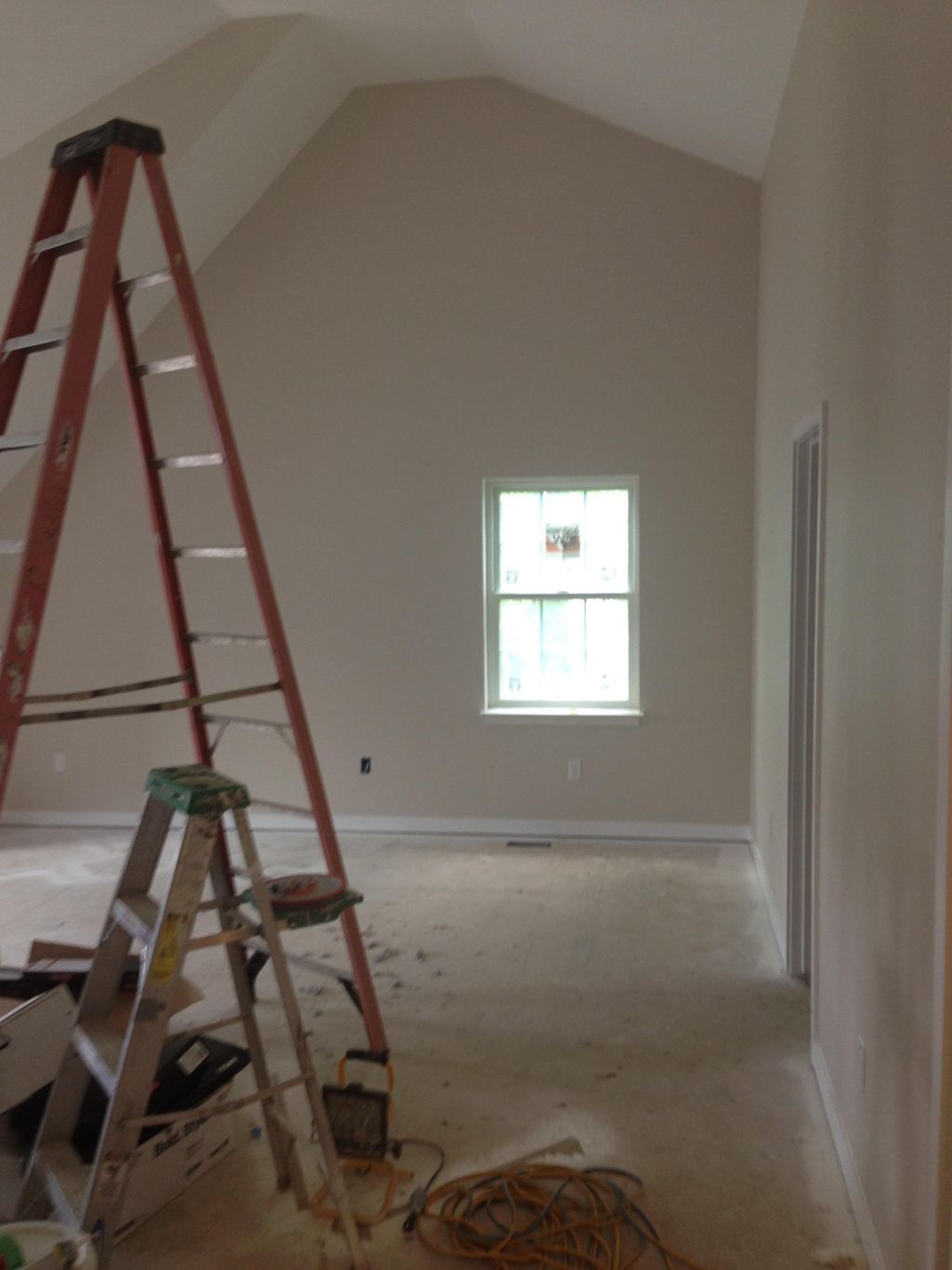 Painting job with high ceilings.
New Construction.