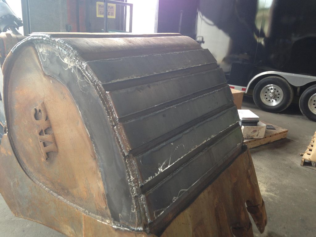 Excavator bucket restoration project after