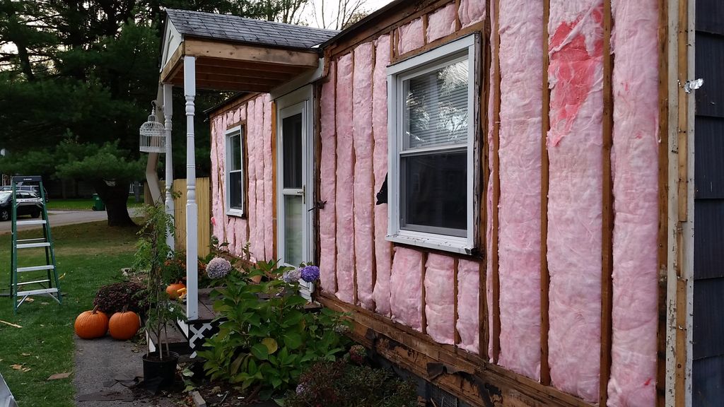 Re-insulation and sheathing replacement prior to n