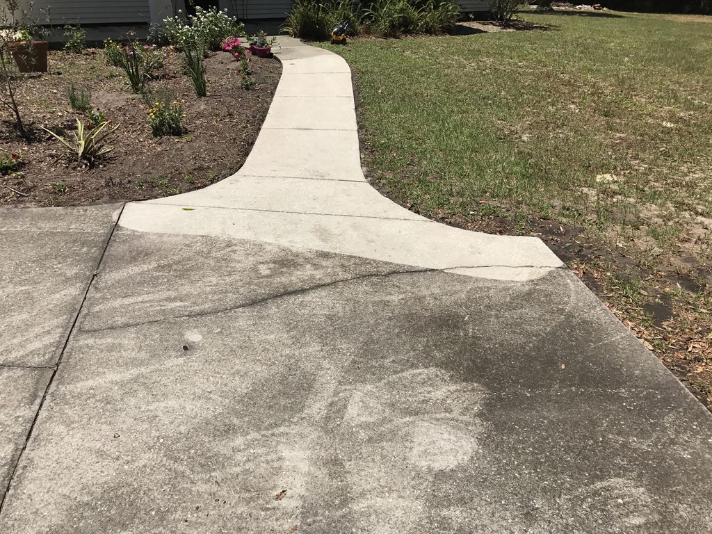 Sidewalk/ Walkway cleaning in progress
