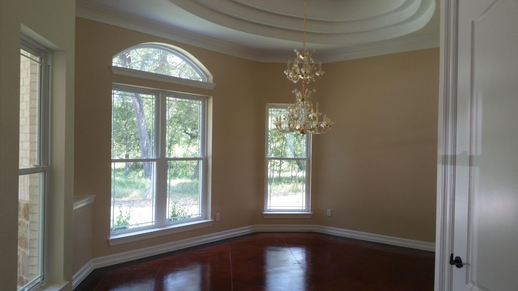 Dining room with 12' oval 3 tier ceiling
