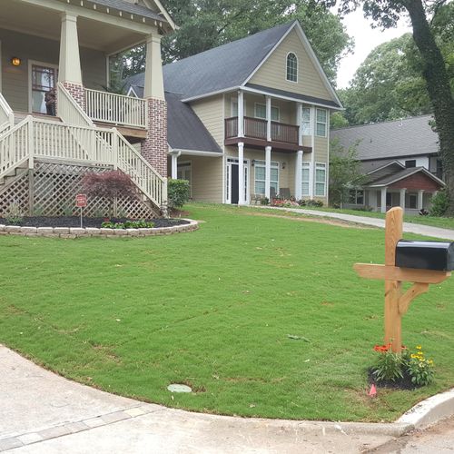 Irrigation system, sod, flower beds, curb, trees t
