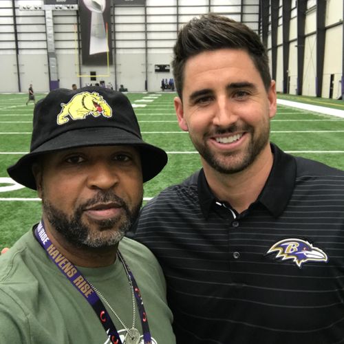 With Dennis Pita of the Baltimore Ravens during th