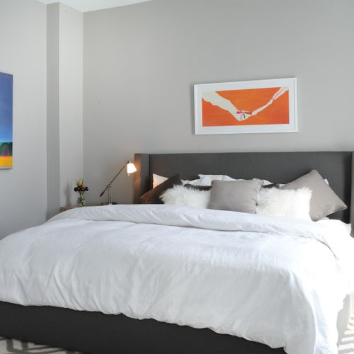 Liza Ryner Design created this modern yet cozy bed