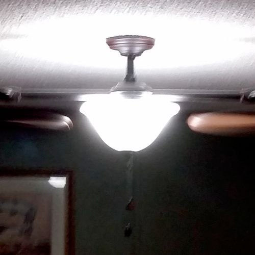 Dual Ceiling Fan Installed Light and Fan On