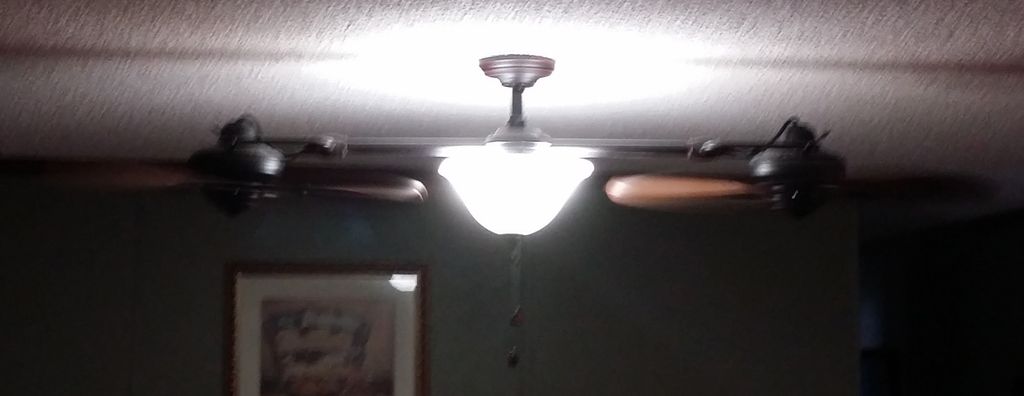 Dual Ceiling Fan Installed Light and Fan On