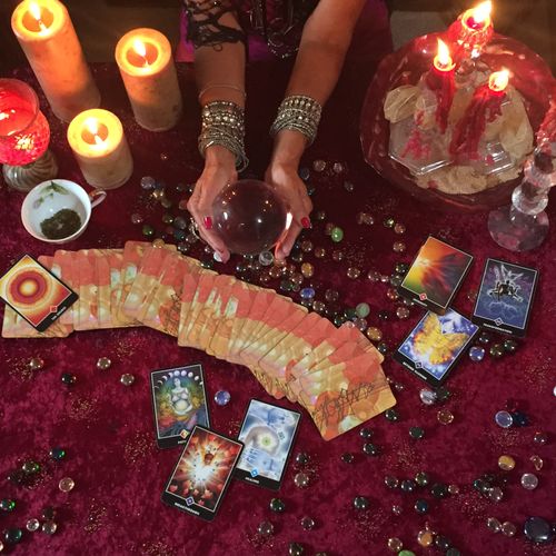 tarot card, tea leaf, crystal ball, runes, astrolo